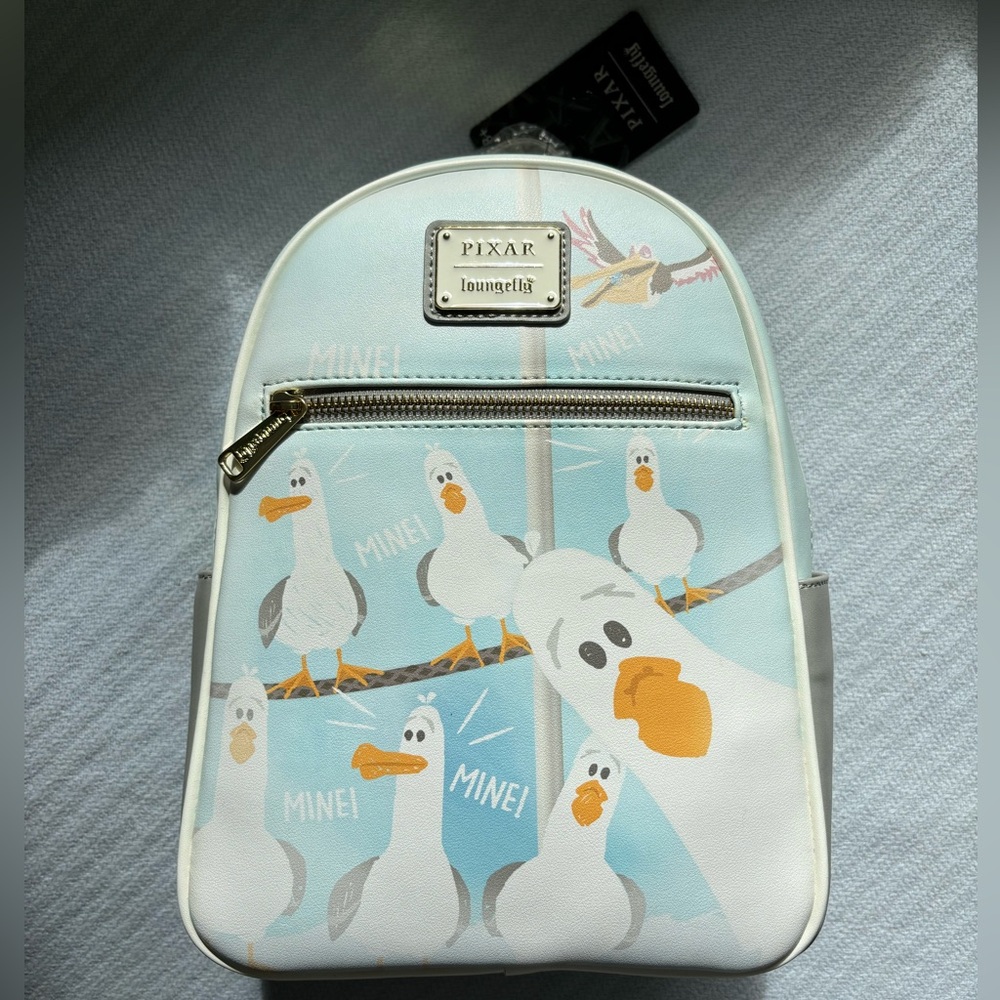 Finding Nemo Seagull “Mine” loungefly, never used pet friendly home tag still on
